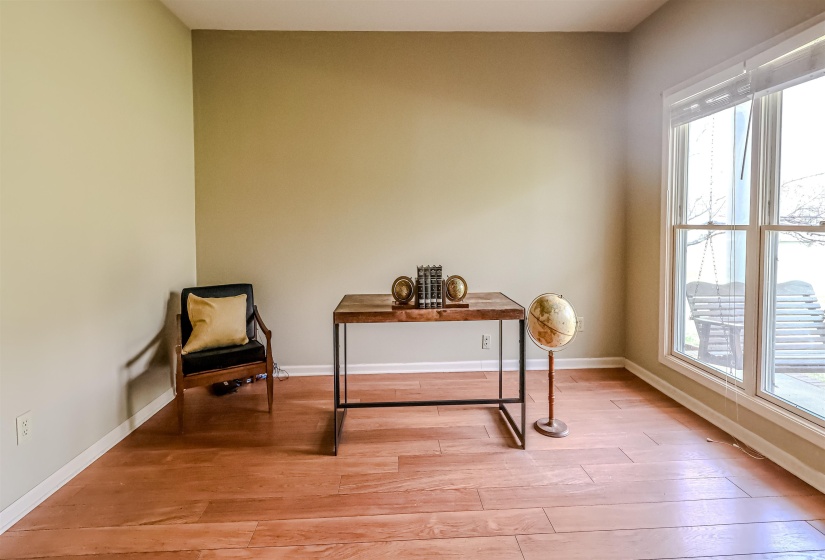 Office featuring baseboards and light wood-style flooring