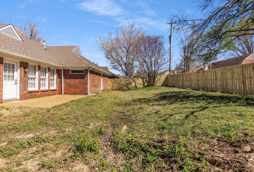 View of fenced backyard