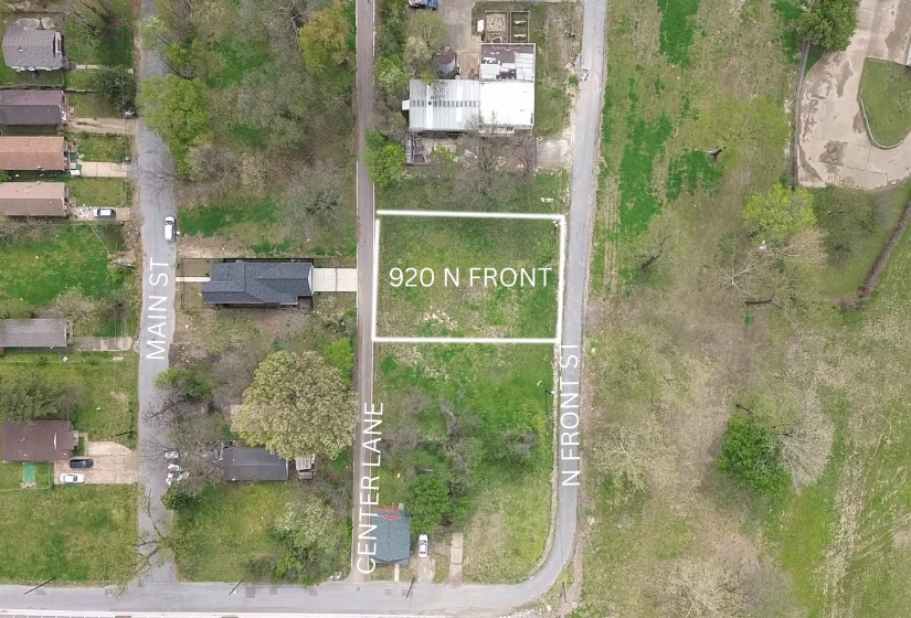 Aerial view of property and surrounding area with property boundaries highlighted