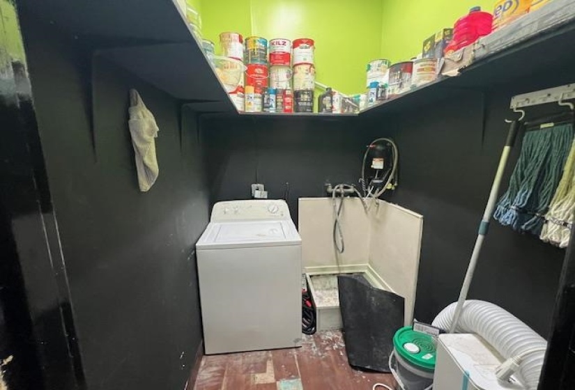 Laundry room with washer / clothes dryer and wood finished floors