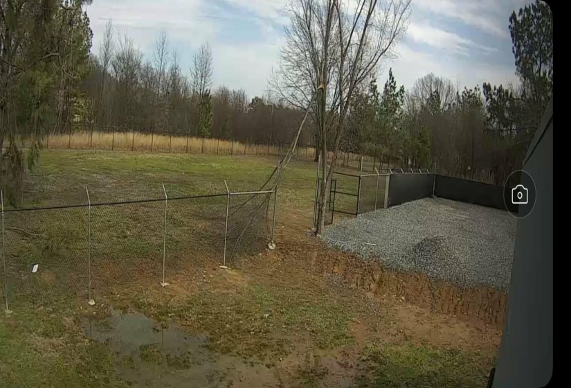 View of yard with a gate