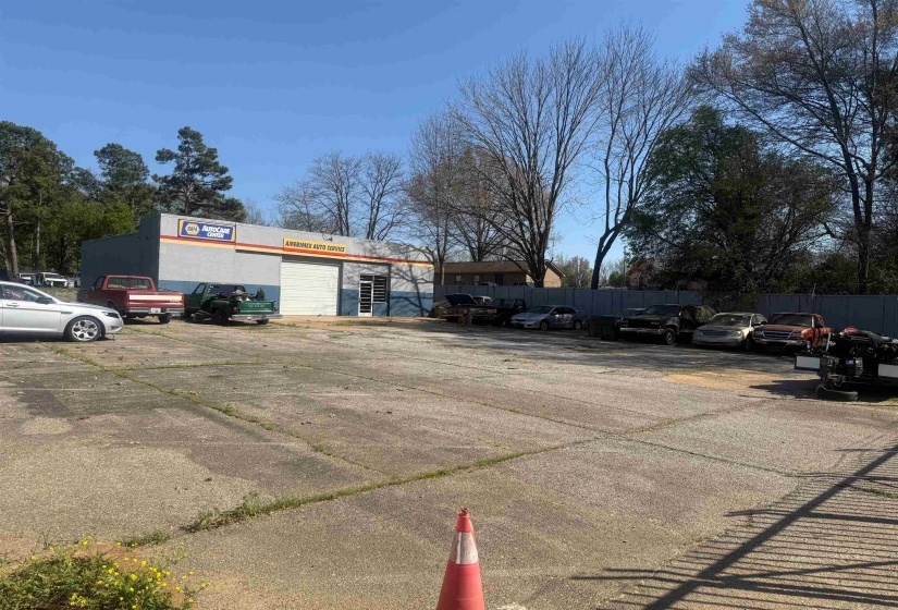 View of front of house with uncovered parking