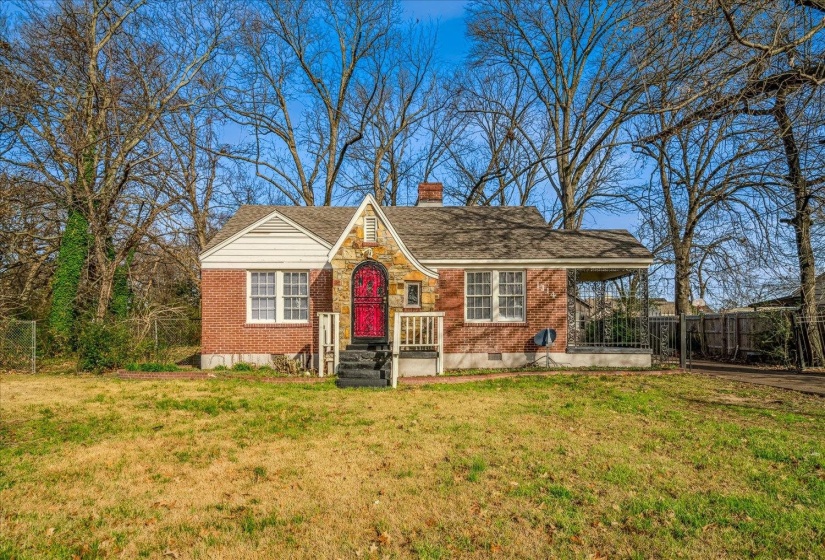 English style home featuring brick siding, a chimney, and roof with shingles