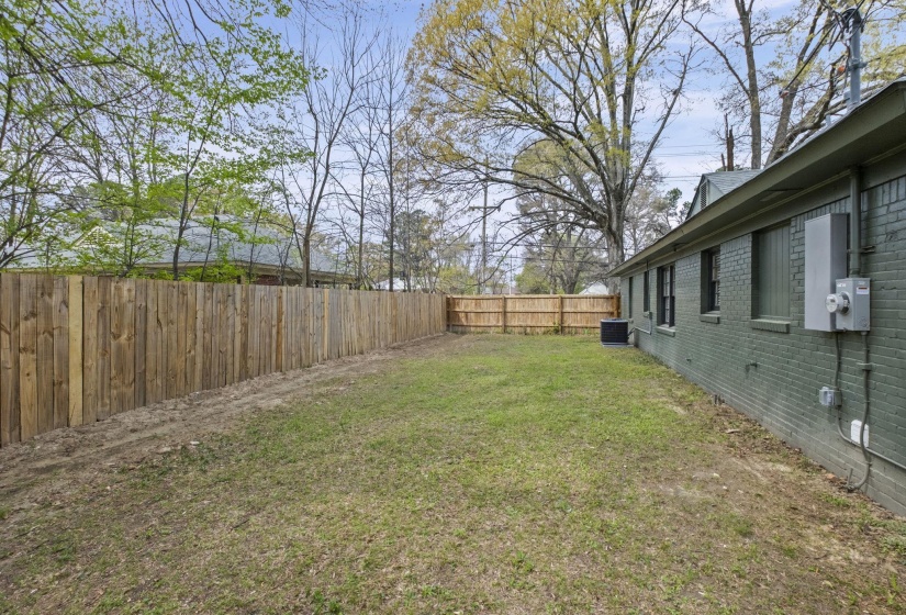 View of fenced backyard