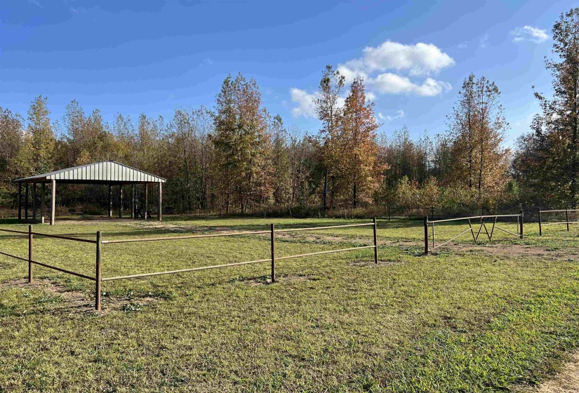 View of yard with a rural view