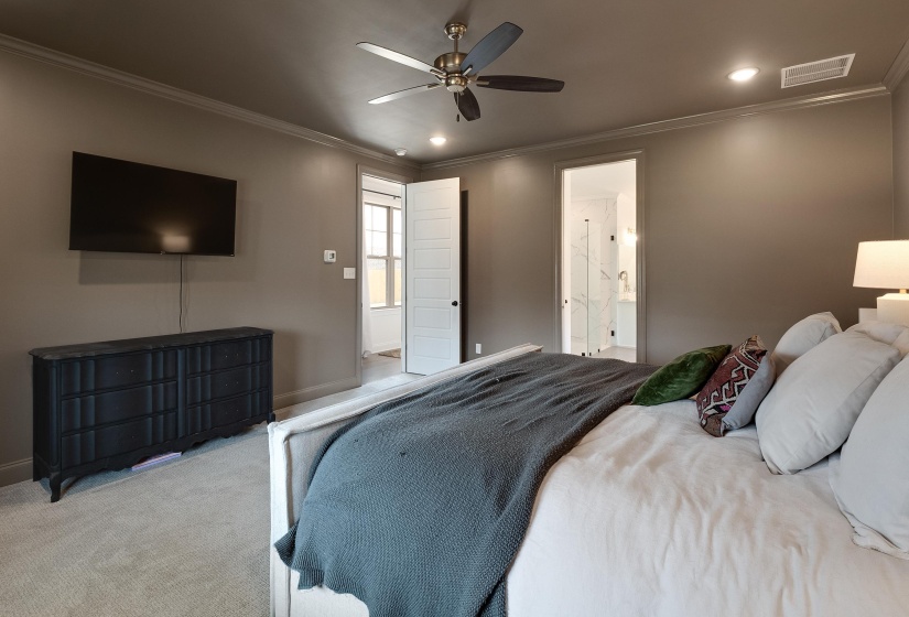 Bedroom with crown molding, carpet floors, recessed lighting, and a ceiling fan