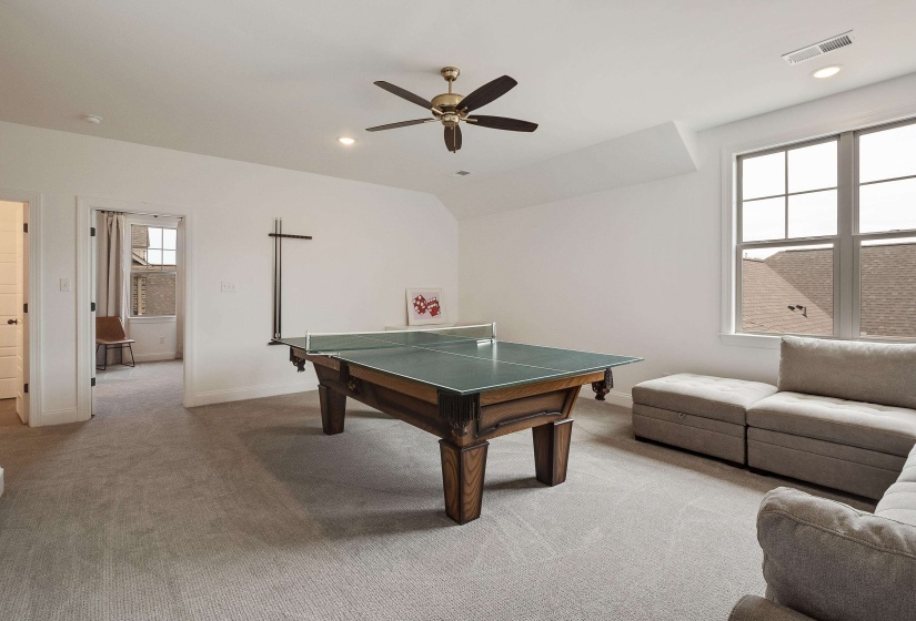 Game room with light carpet, a ceiling fan, and recessed lighting