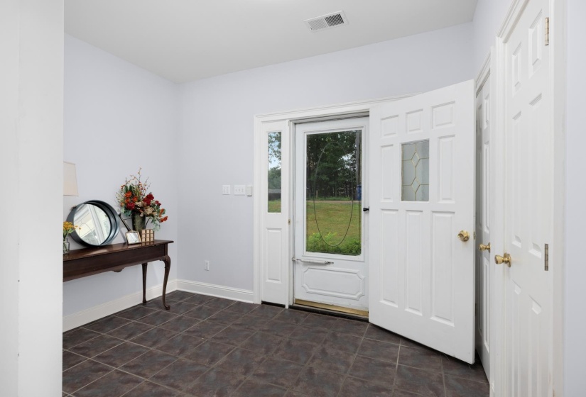 Foyer featuring baseboards