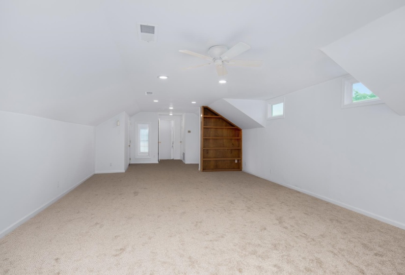 Bonus room featuring recessed lighting, carpet, ceiling fan, and vaulted ceiling