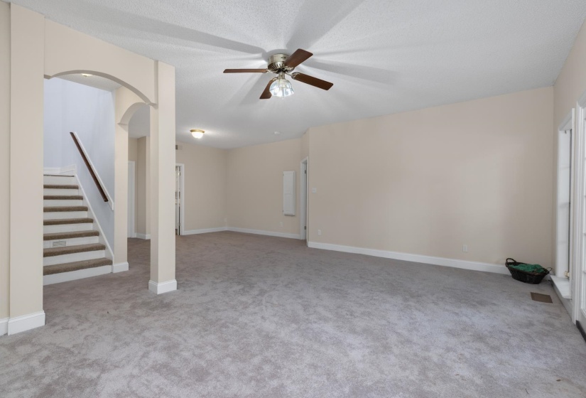 Downstairs living room with covered patio and lake views