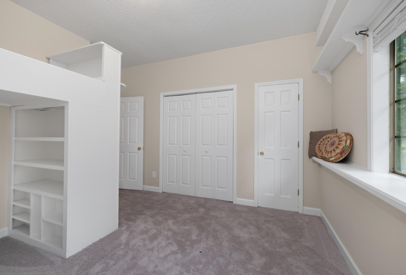 Downstairs bedroom with built-in bunk beds
