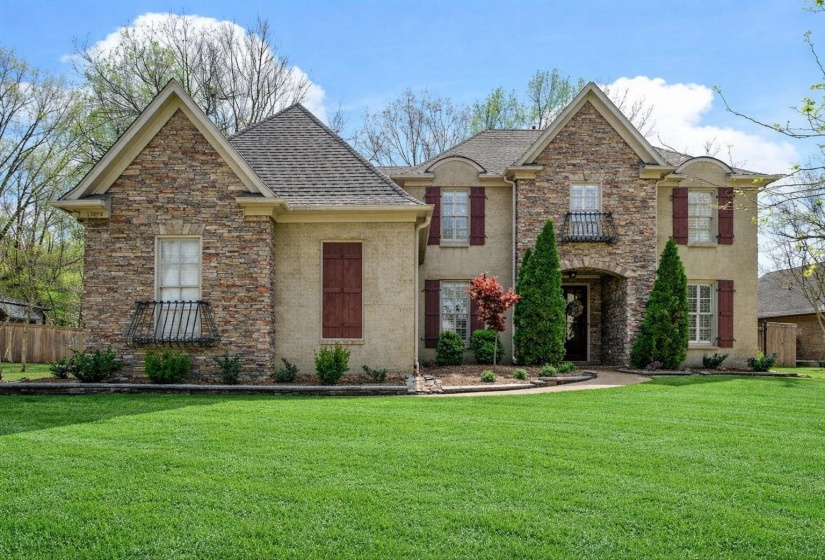 The lawn has been enhanced in the photos to show its full potential.