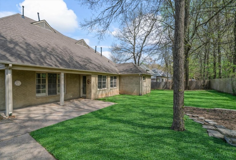 The lawn has been enhanced in the photos to show its full potential.