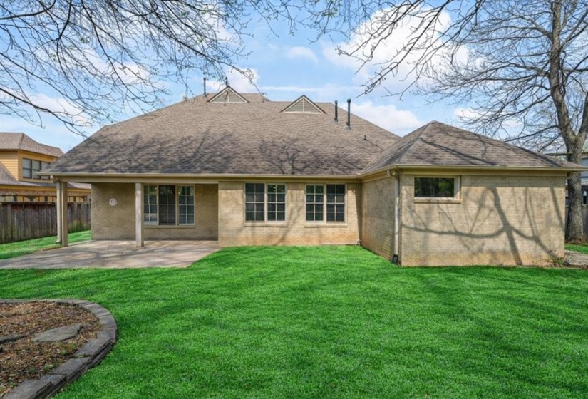 The lawn has been enhanced in the photos to show its full potential.