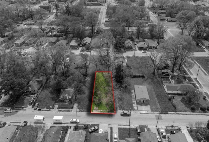 Aerial perspective of suburban area with property boundaries highlighted