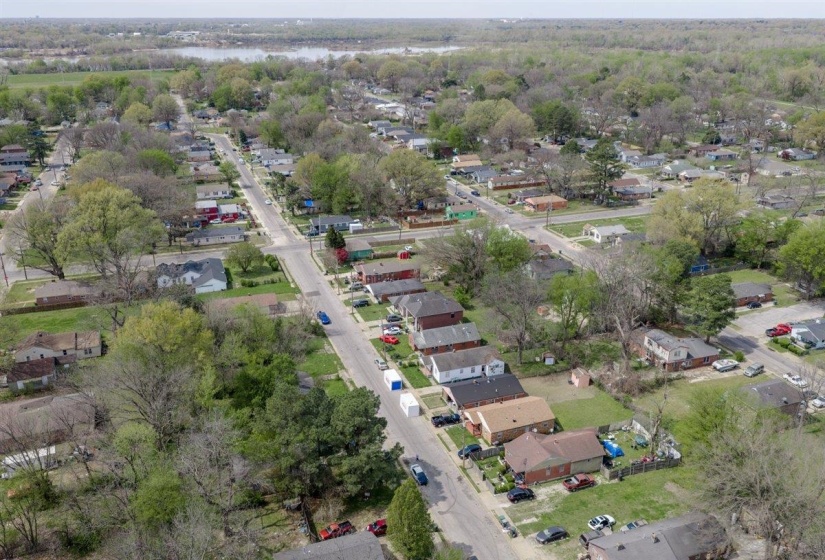 View of property location with nearby suburban area