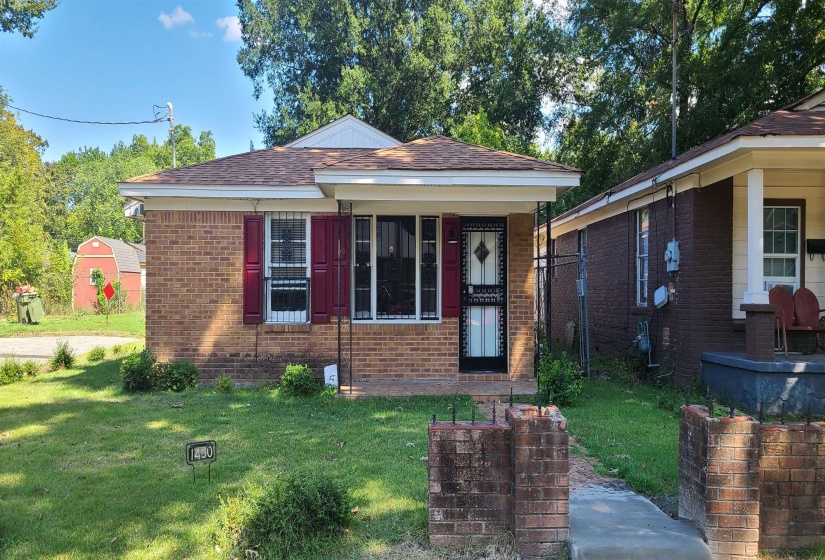 Bungalow with a front lawn