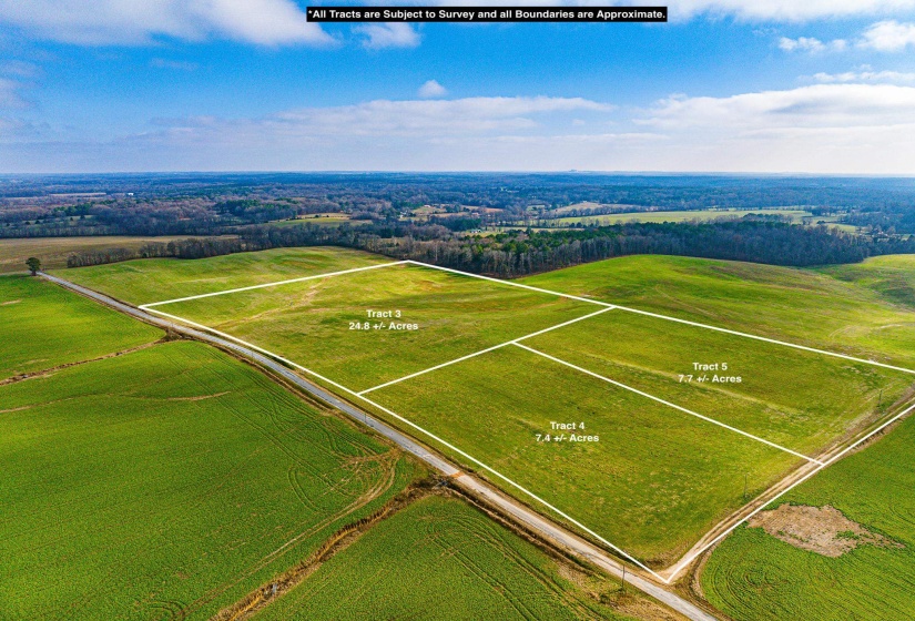 Aerial view of sparsely populated area featuring property parcel outlined