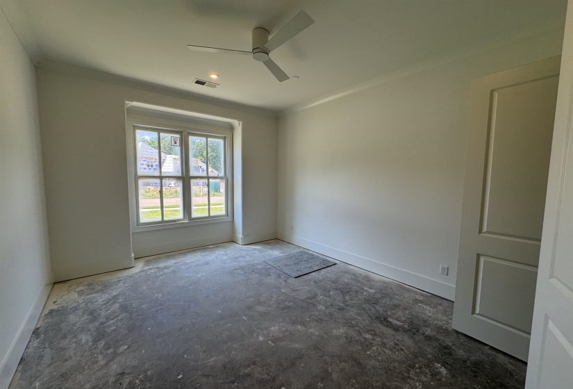 Naturally lit room featuring a multi-pane window, crown molding, a flush-mount ceiling fan, and recessed lighting