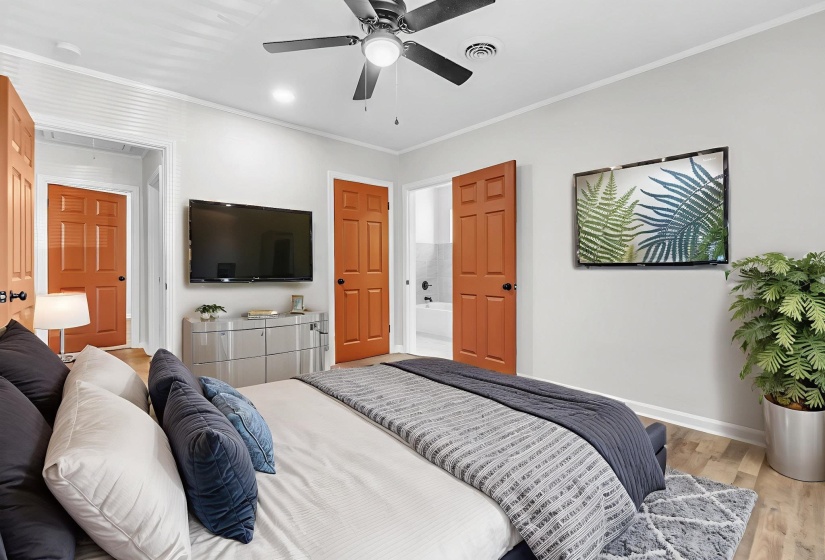Bedroom featuring crown molding, light wood-style floors, ceiling fan, and recessed lighting
