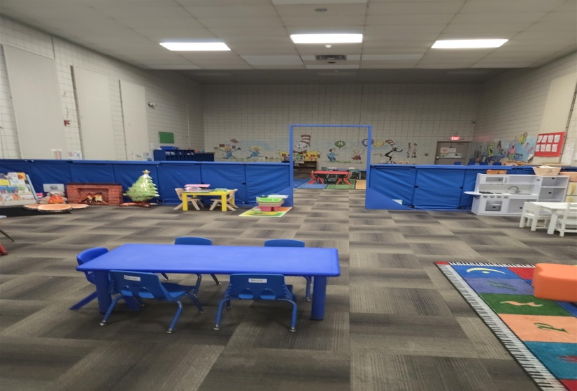 Game room featuring visible vents, carpet, and a drop ceiling