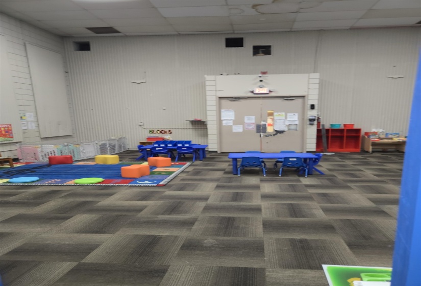 Community lobby with a paneled ceiling