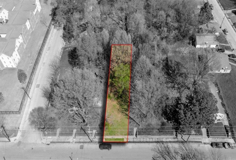 Aerial overview of property's location featuring property boundaries highlighted