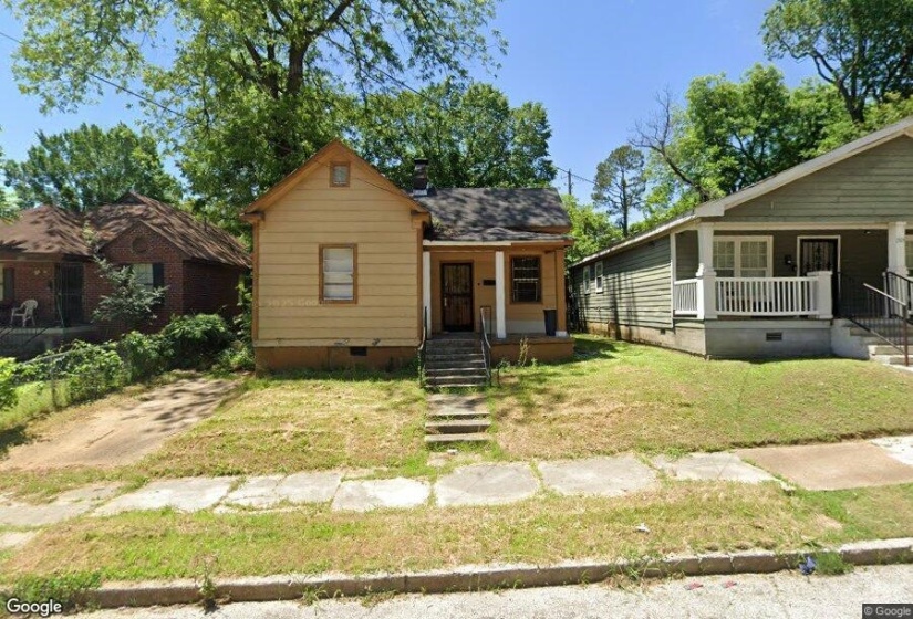 Bungalow-style home with crawl space, covered porch, and a front yard