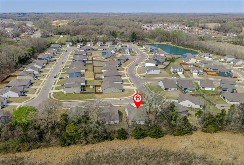 Aerial view of residential area with a nearby body of water
