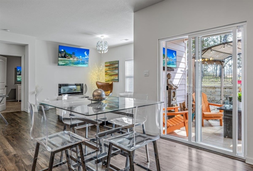 Dining space featuring hardwood / wood-style floors and a chandelier
