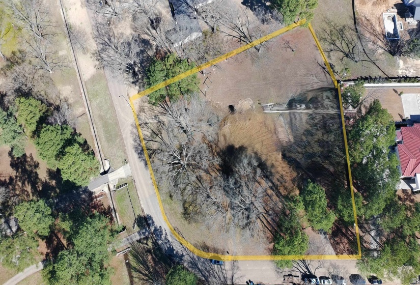Aerial overview of property's location featuring property parcel outlined