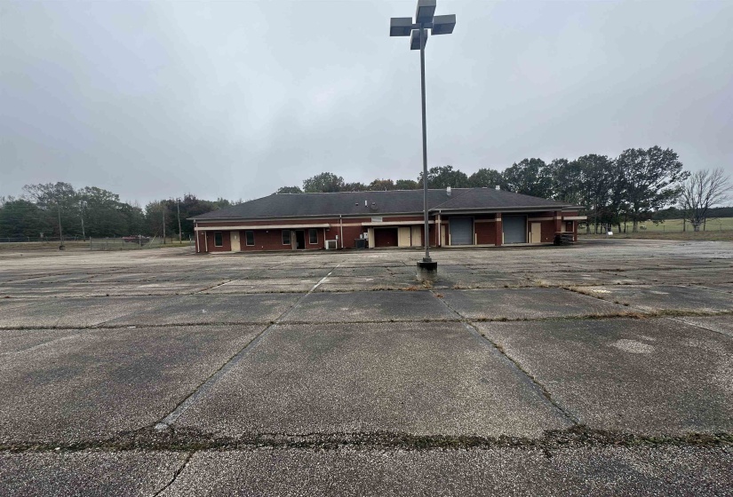 View of front of property with uncovered parking