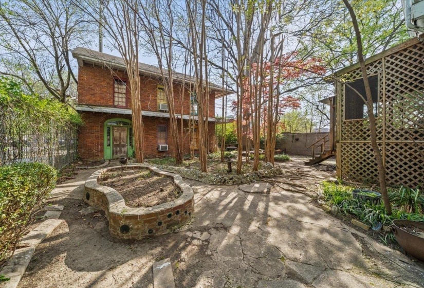 Back of house with brick siding