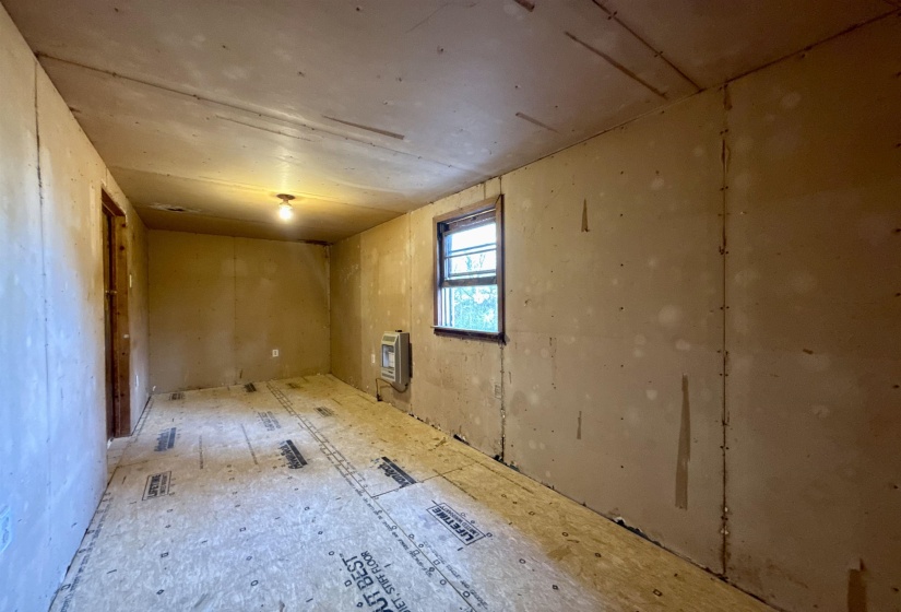 Empty room with heating unit