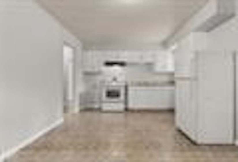 Kitchen with white cabinetry