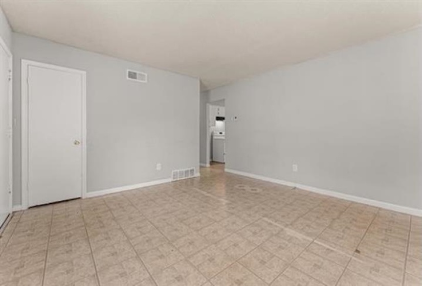 Unfurnished room featuring baseboards