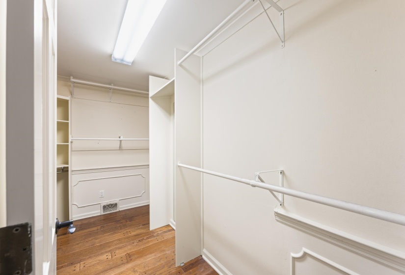 Walk in closet featuring hardwood / wood-style flooring