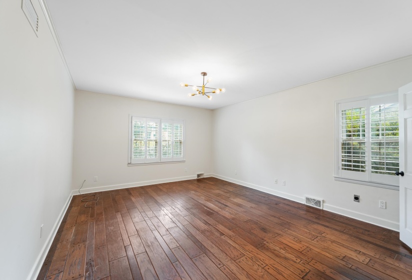 2nd master bedroom suite on first floor - Pegged hardwood floors