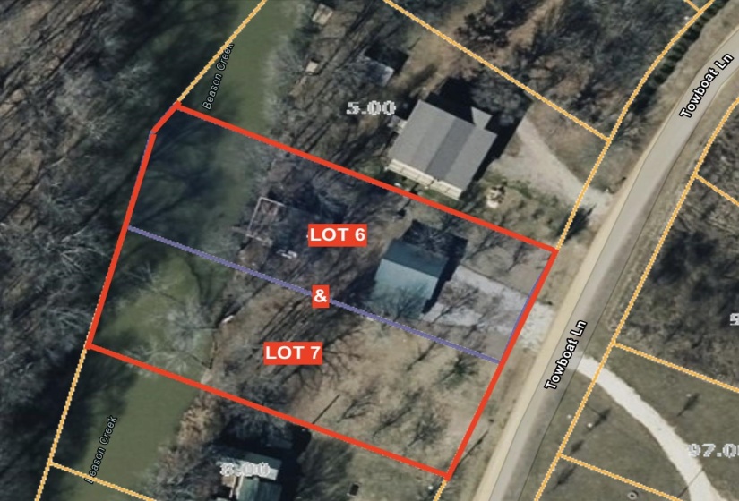 Aerial view of property's location with property boundaries highlighted. NOT A SURVEY!