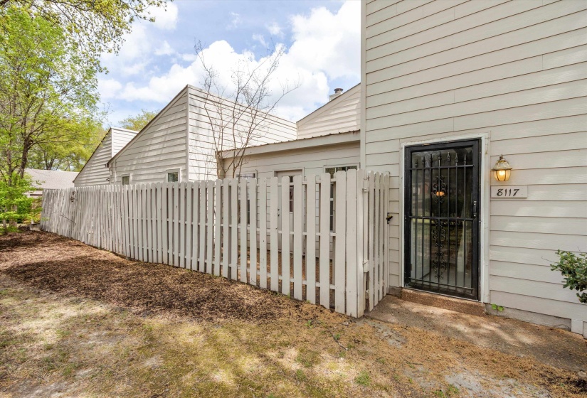 Doorway to property featuring a gate
