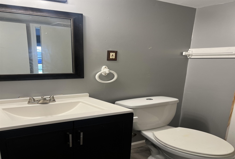 Bathroom with vanity and toilet