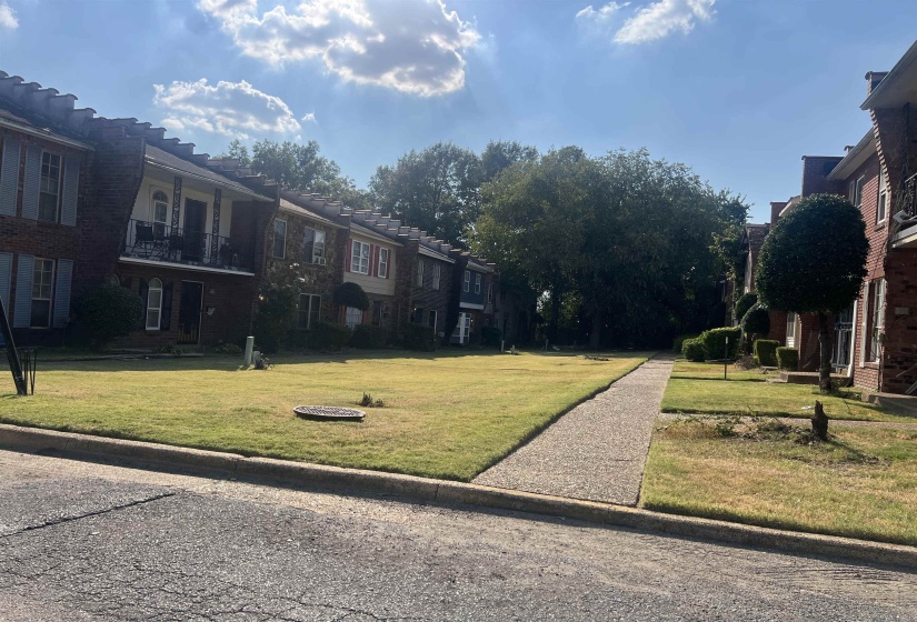 View of community with a lawn and a residential view
