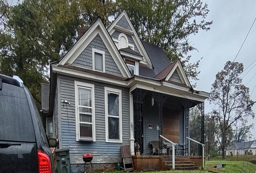 View of front of home featuring covered porch