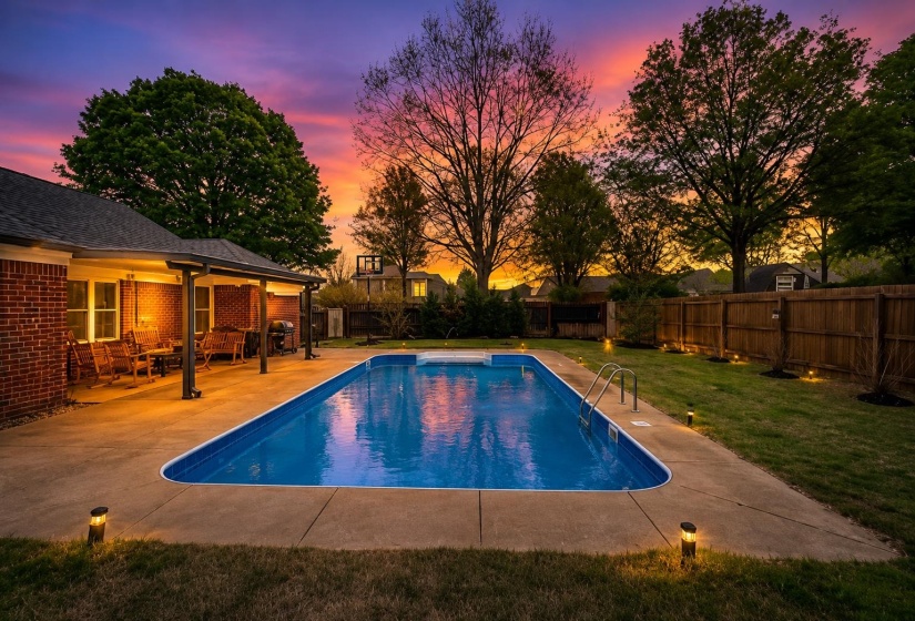 Resort-style backyard oasis! Enjoy a sparkling in-ground pool, expansive covered patio, and breathtaking sunset views. Perfect for entertaining or relaxing, this private retreat offers the blend of comfort, &outdoor living. Image has been virtually staged
