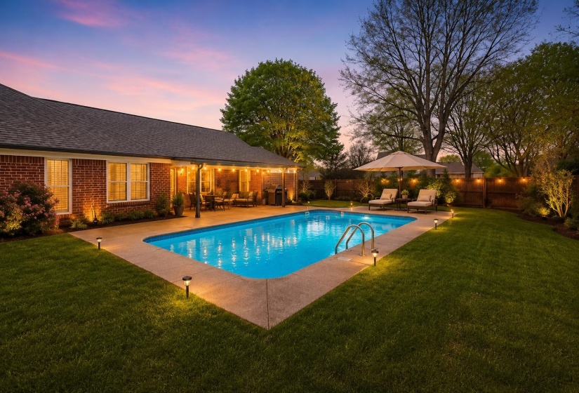 Escape to your own private backyard retreat featuring a heated in-ground pool, expansive patio, and plenty of space for outdoor entertaining. Whether hosting summer gatherings or enjoying a quiet evening swim. This image has been virtually staged,