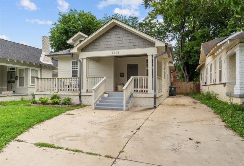 Bungalow featuring covered porch