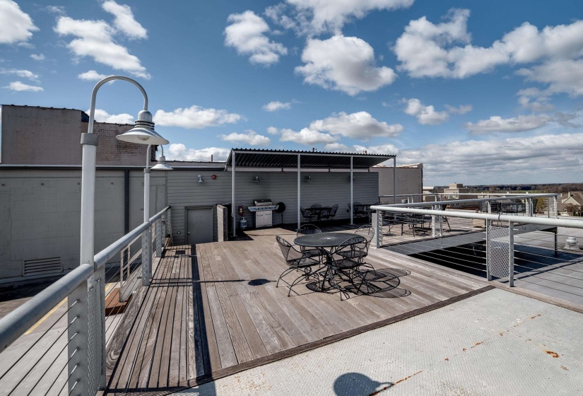 Wooden deck with a grill