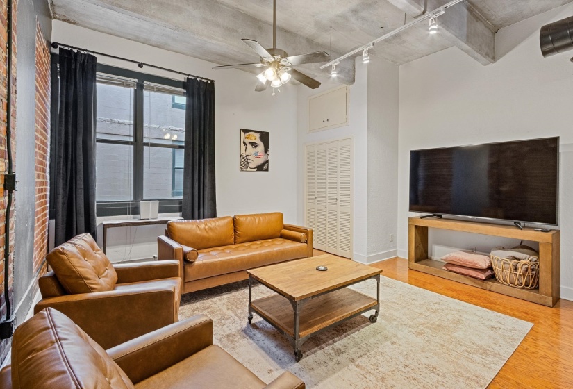 Fabulous high ceilings, wood floors and large window