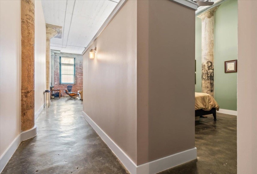 Hall featuring concrete flooring