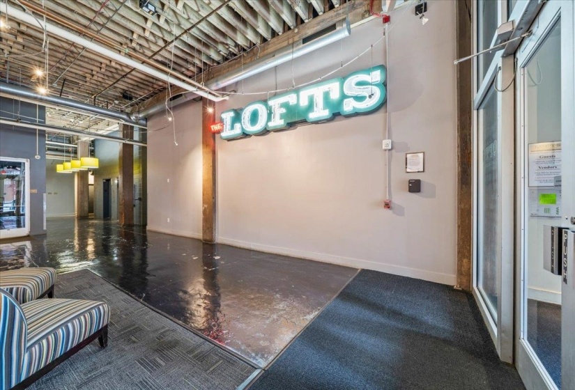 Garage featuring baseboards